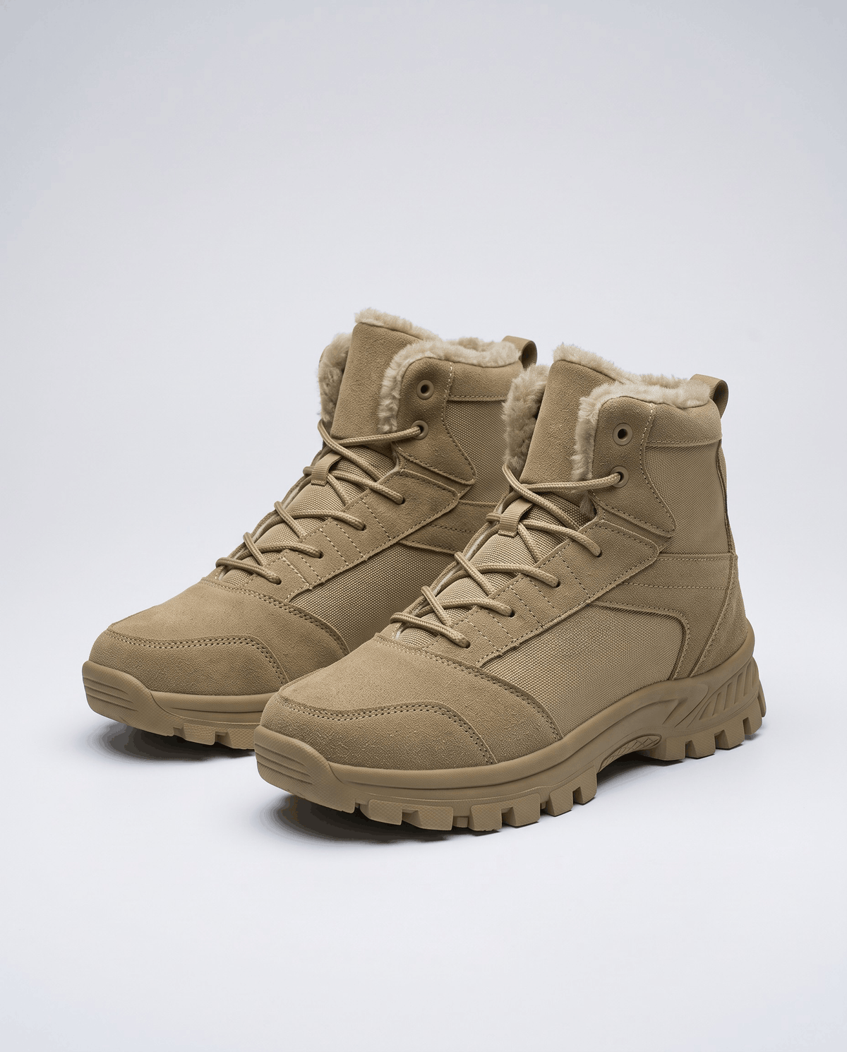Men's fleece-lined trail boots in tan with a chunky lug outsole, angled view