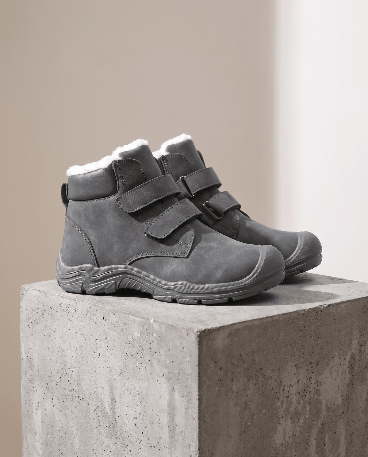 Gray insulated ankle boots shown together from above.