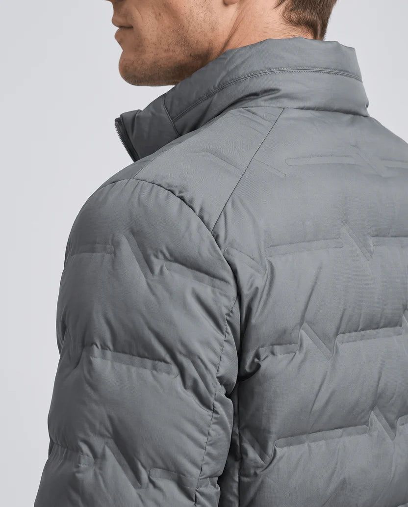 Close-up of the quilted shoulder and stand collar on a gray puffer jacket