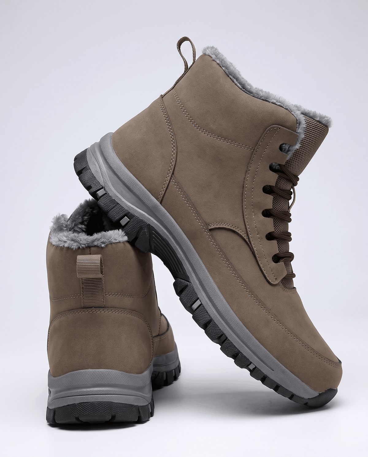 Single brown boot photographed outdoors from the side, high shaft above the ankle
