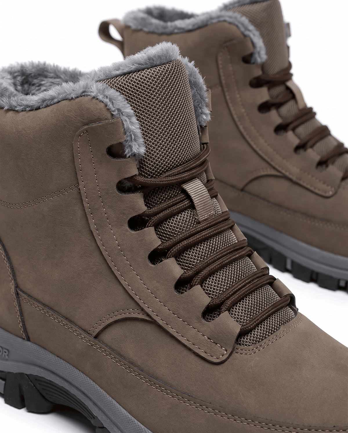 Brown boot turned to the side, fleece lining visible at the collar