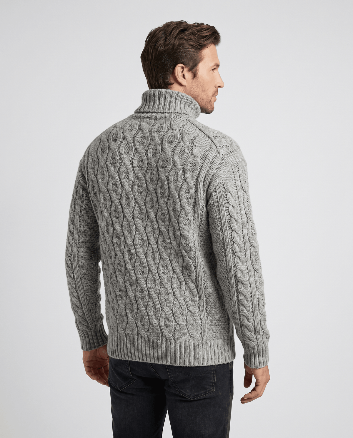 Back view of light gray turtleneck sweater with oval cable pattern