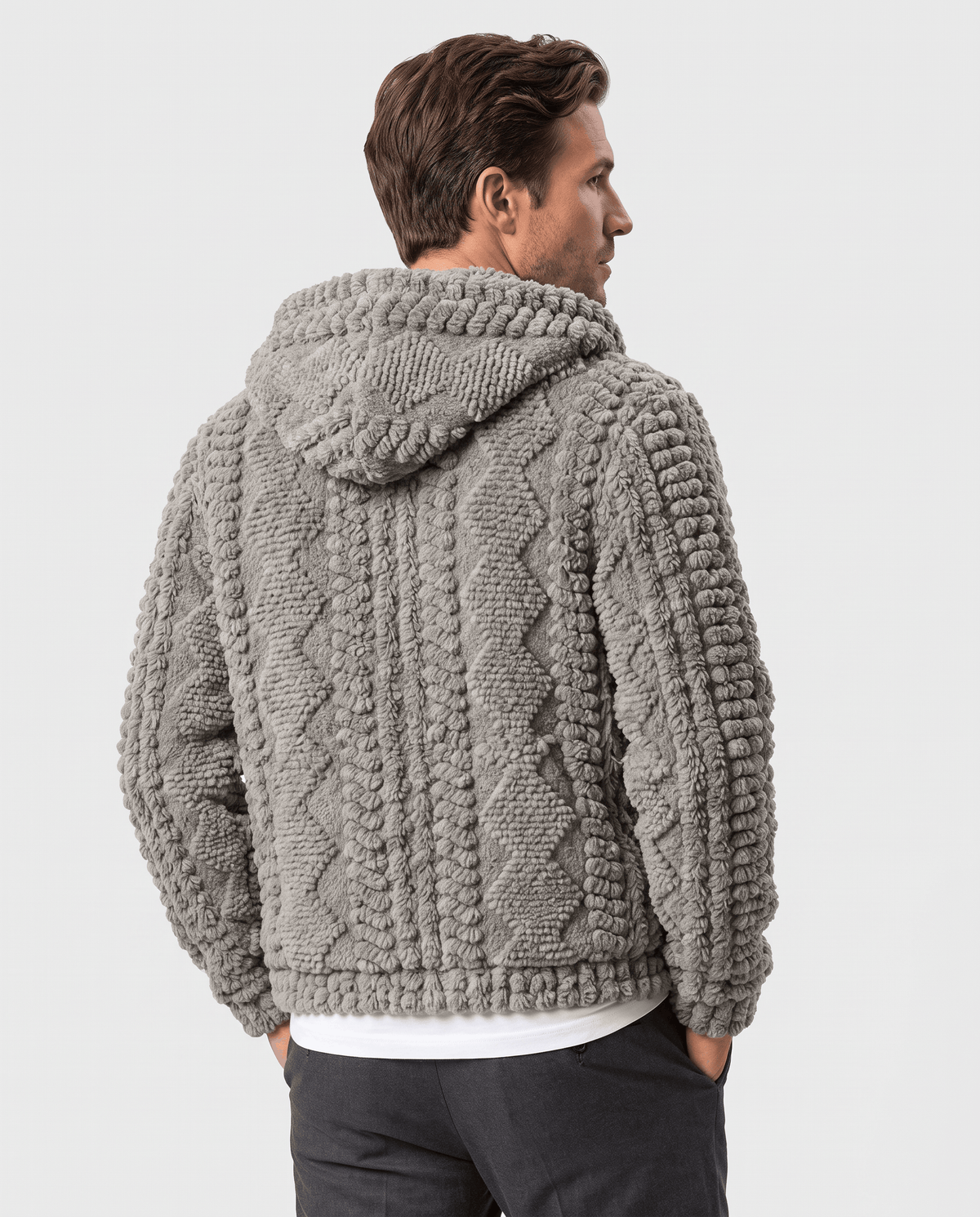 Back of gray hooded jacket showing the cable-knit pattern and hood from behind