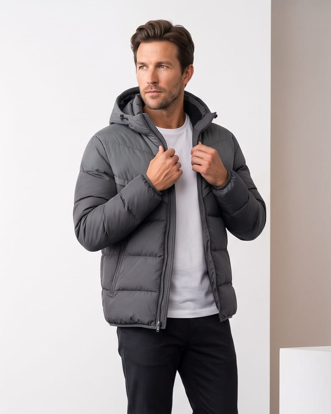 Gray colorway worn open over a white tee, hood resting at the shoulders