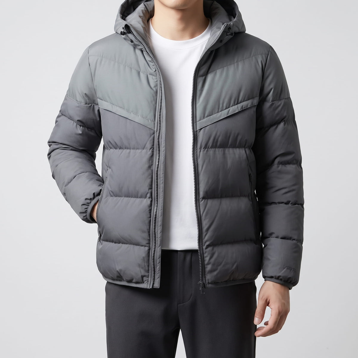 Gray jacket zipped to the chest, showing zip hand pockets at the hip