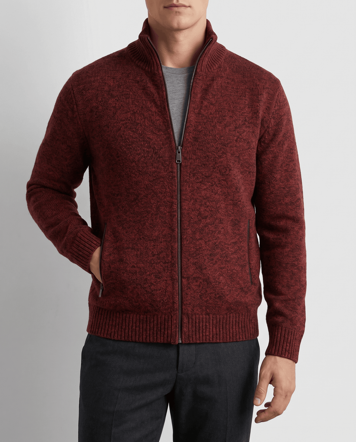 Close-up of the red knit cardigan open over a gray tee