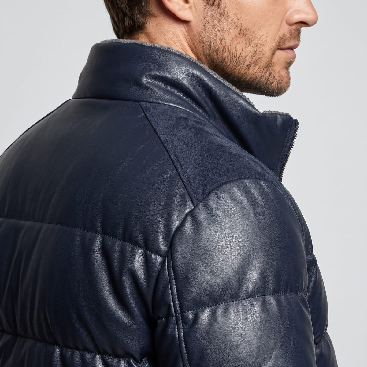 Close-up of the blue Northstar bomber stand collar with sherpa-look lining and contrast stitching
