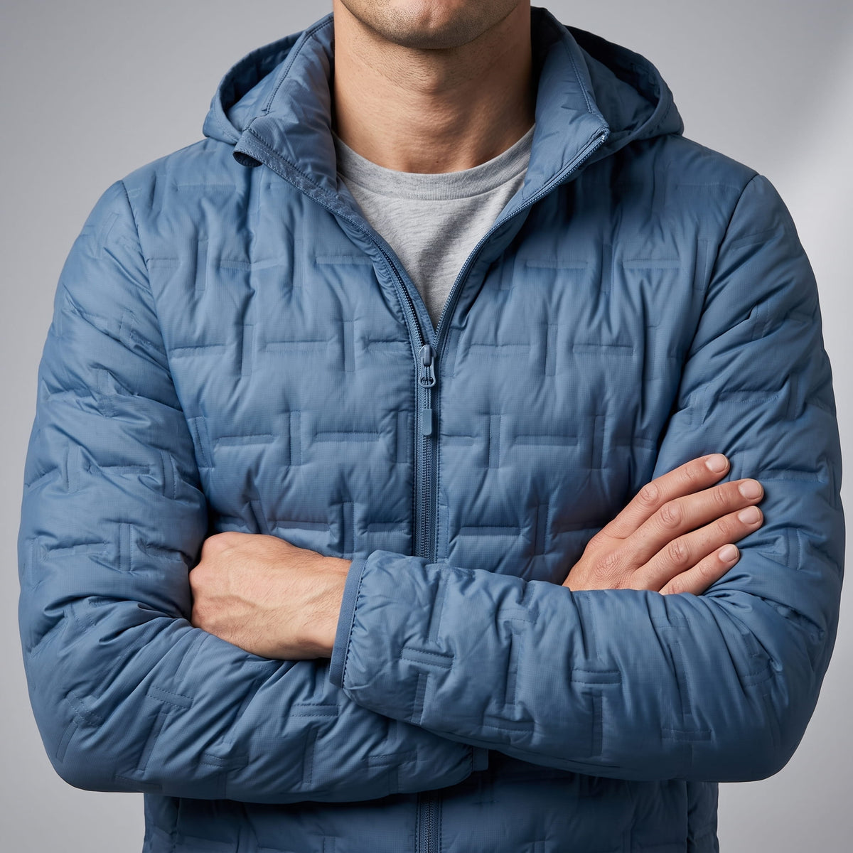 Blue jacket close view of the sleeves and full-length front zip