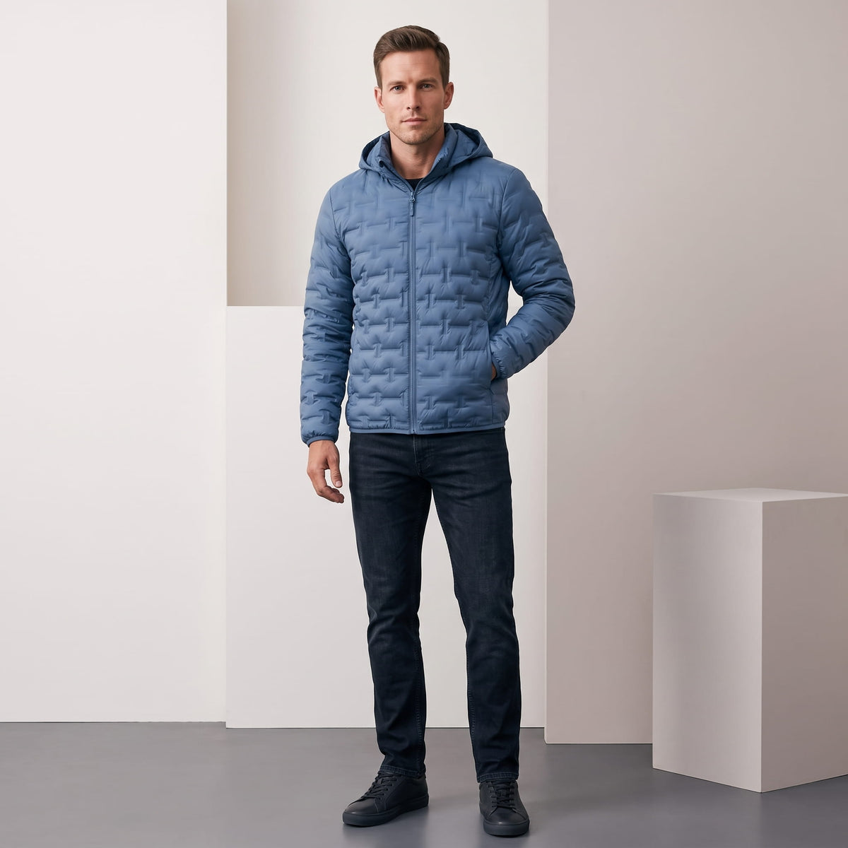 Blue jacket styled full-length with dark trousers and black boots