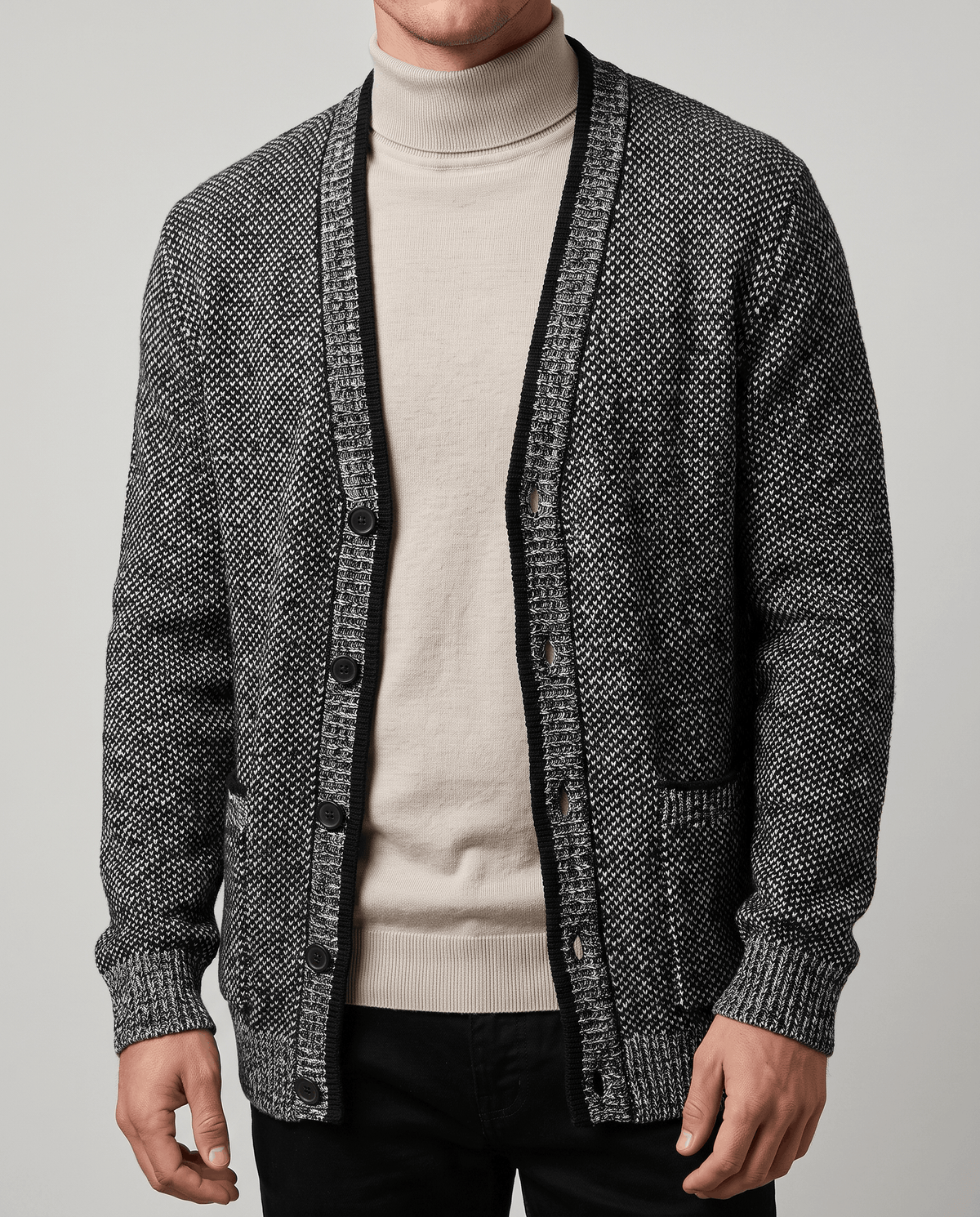 Close-up of the dark gray cardigan with black trim and hip pocket