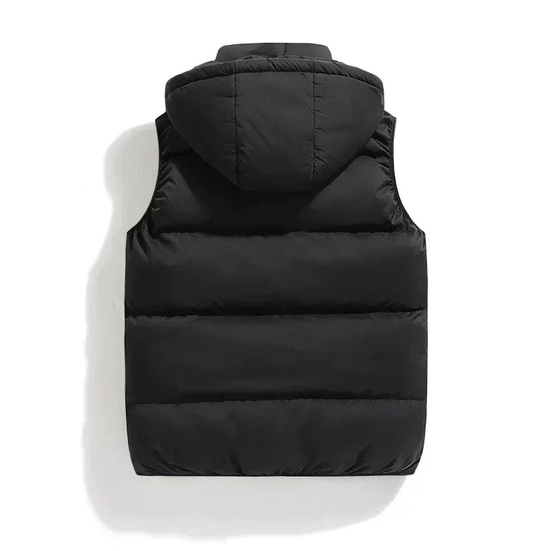 Back of black padded vest with hood attached laid flat