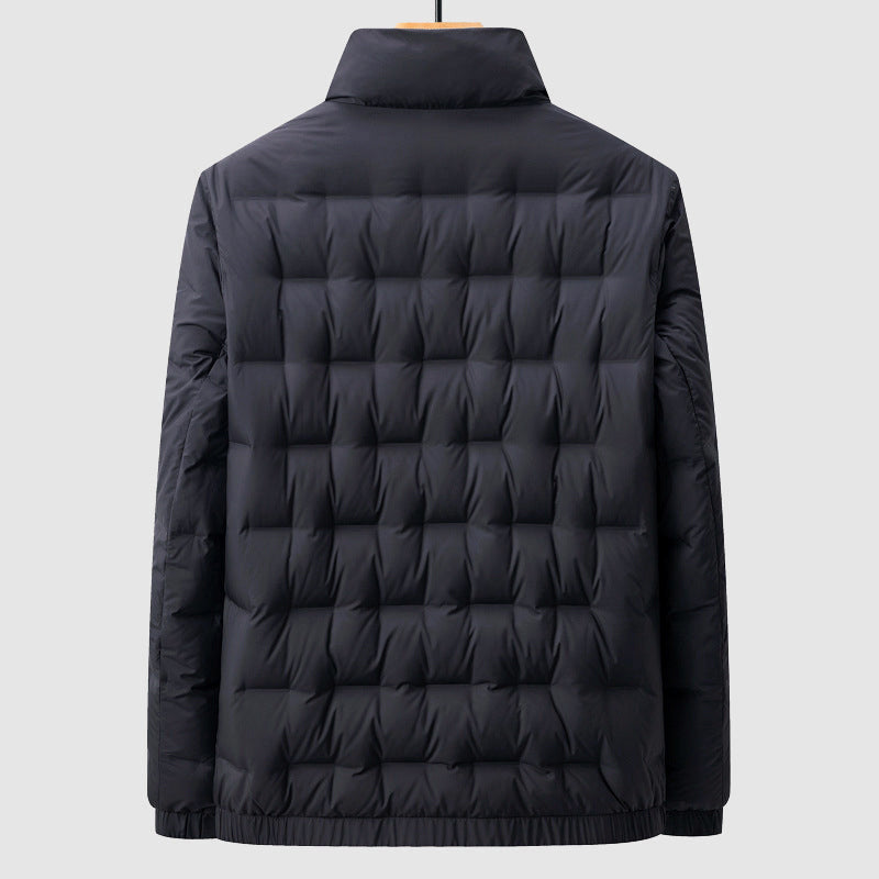 Back view of the Sutton quilted down jacket laid flat, showing square block quilting across the body and sleeves