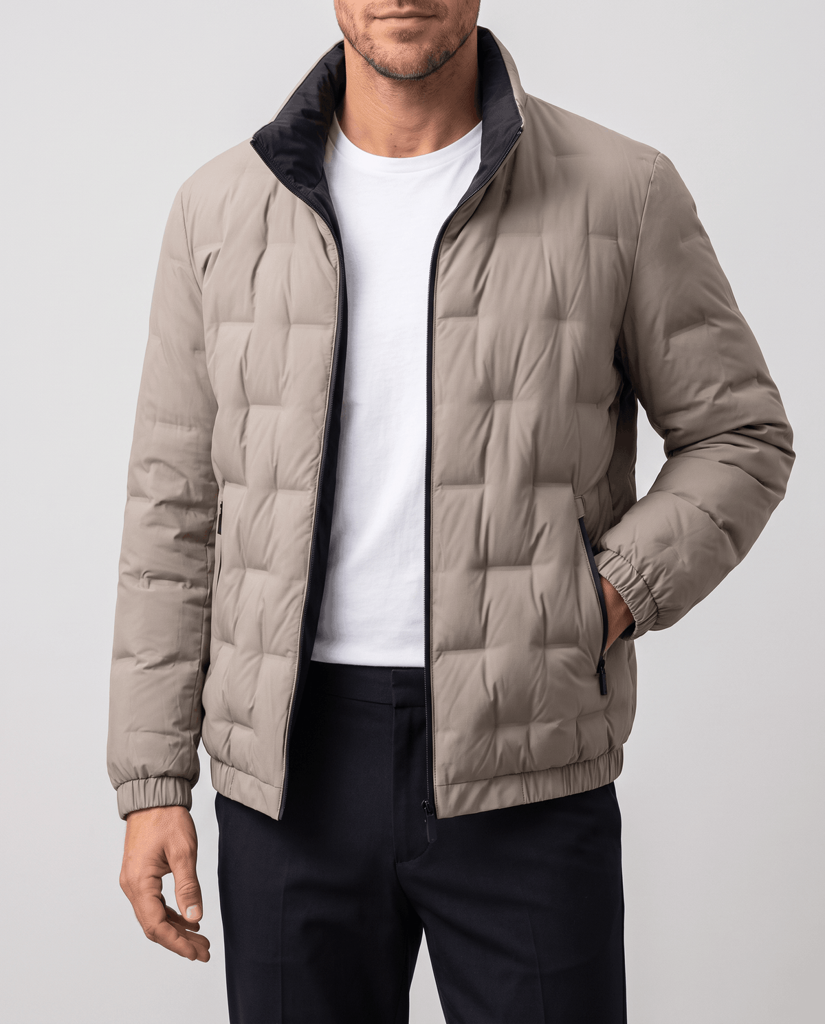 Beige Sutton quilted down jacket worn open with contrast dark inner lining and stand collar