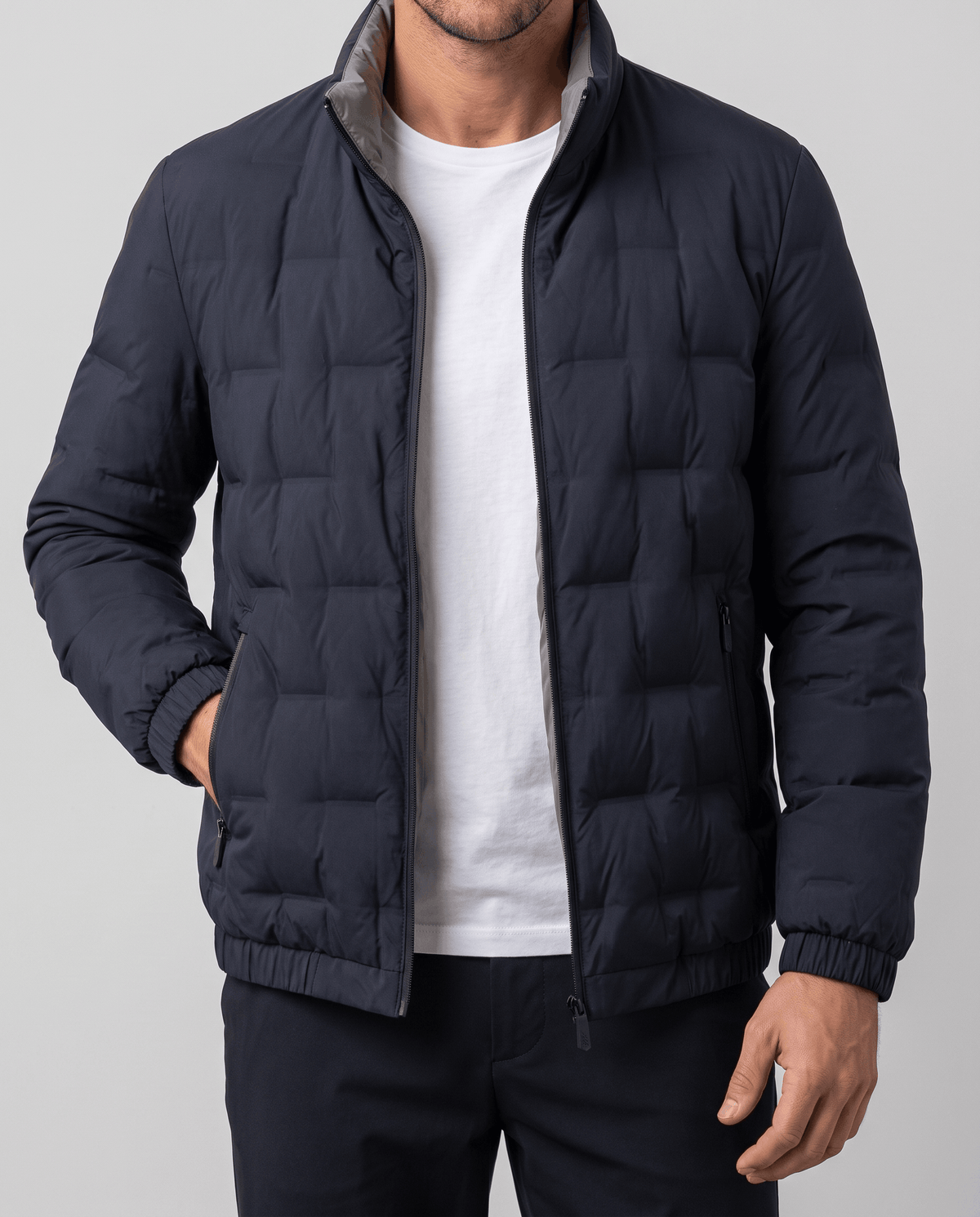 Blue Sutton quilted down jacket worn open showing the beige inner collar lining and zip side pocket