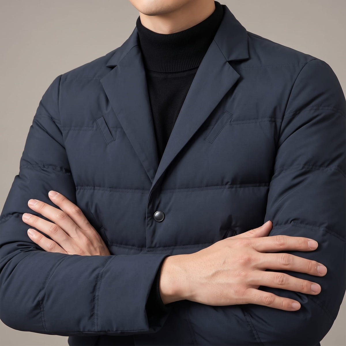 Close view of the navy lapel and two-button front over a black turtleneck