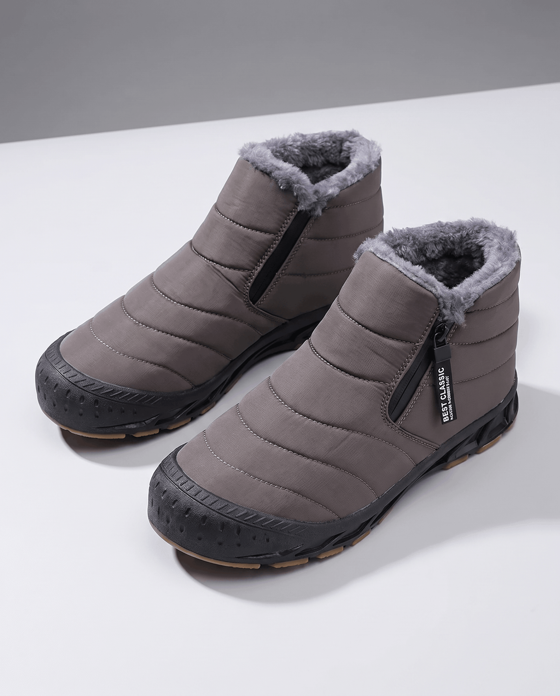 Pair of gray insulated ankle boots shown together.