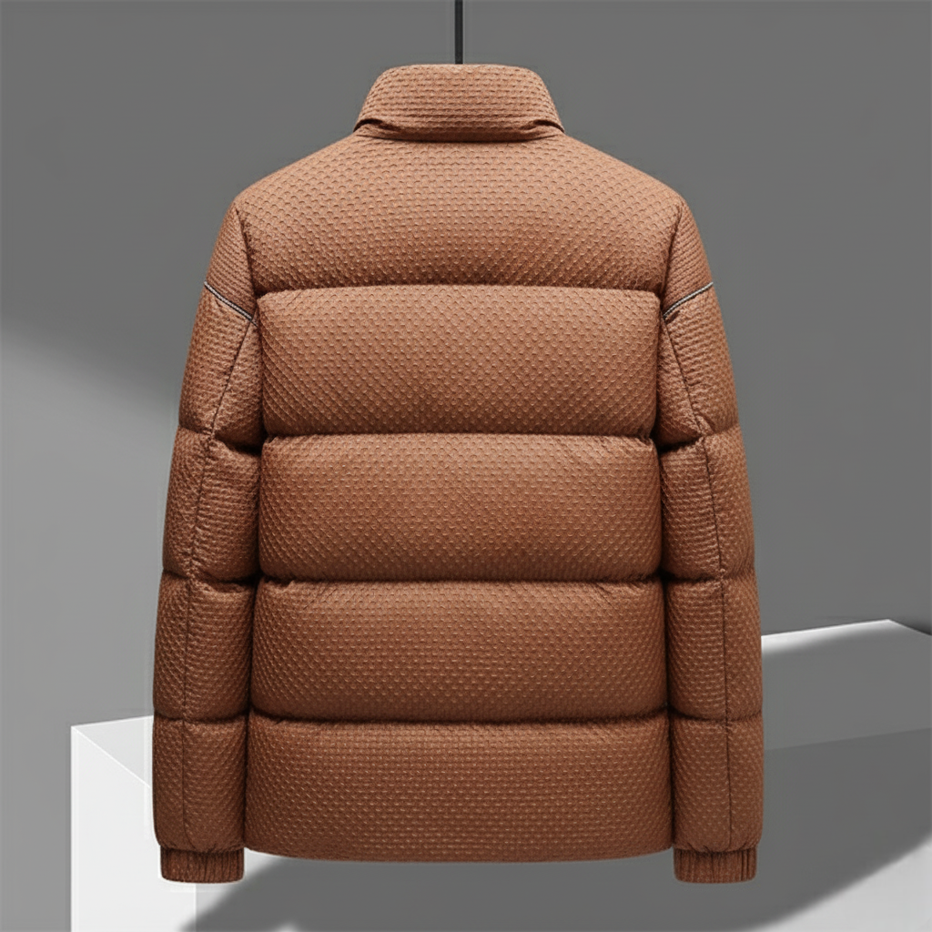 Caramel brown puffer viewed from the back on a hanger with ribbed cuffs visible