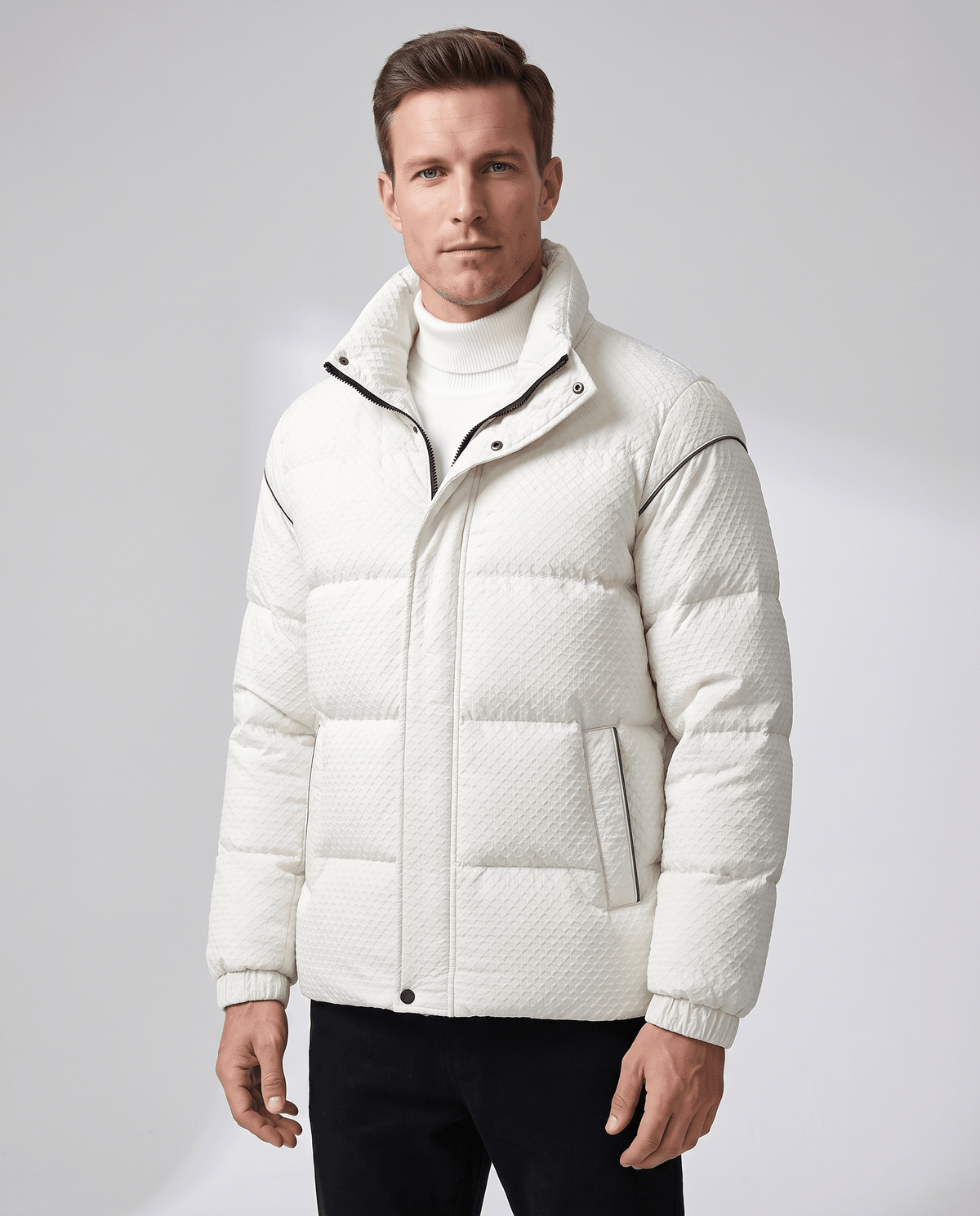 White puffer jacket front view worn open over a cream knit turtleneck