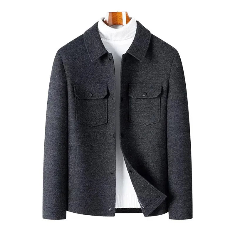 Jacket shown on a form, front open to reveal the pocket flaps and placket
