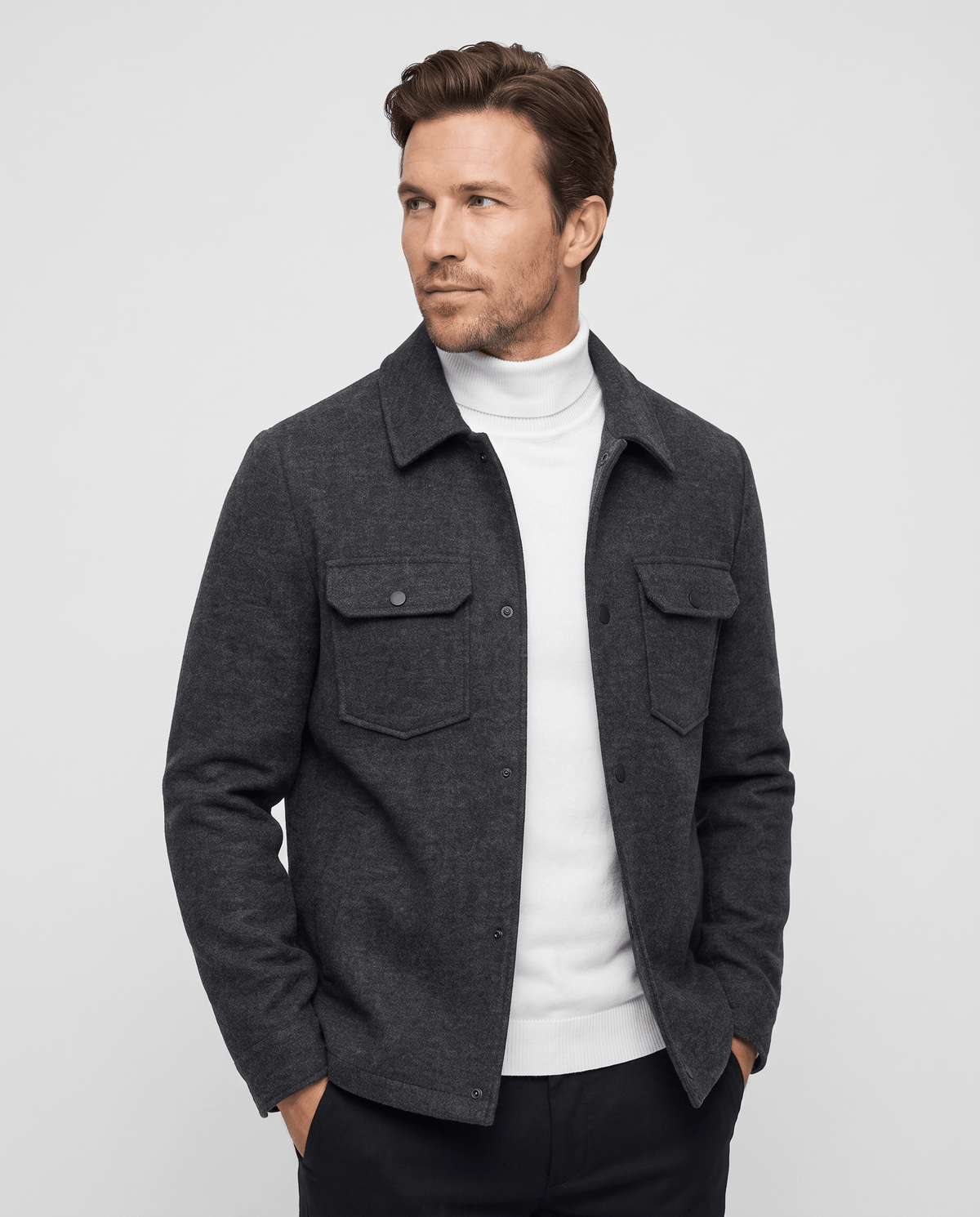 Men's short wool-blend jacket in dark gray, worn open over a white turtleneck