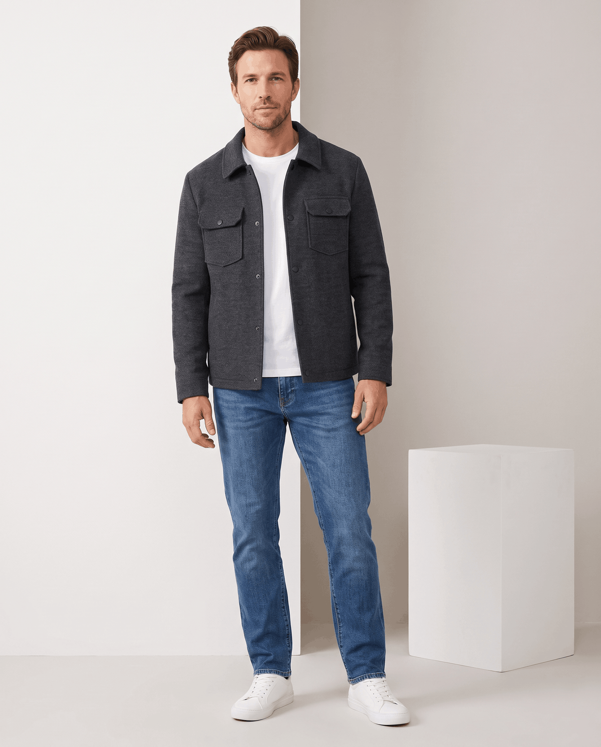 Full-length shot of the jacket worn with blue jeans and white sneakers