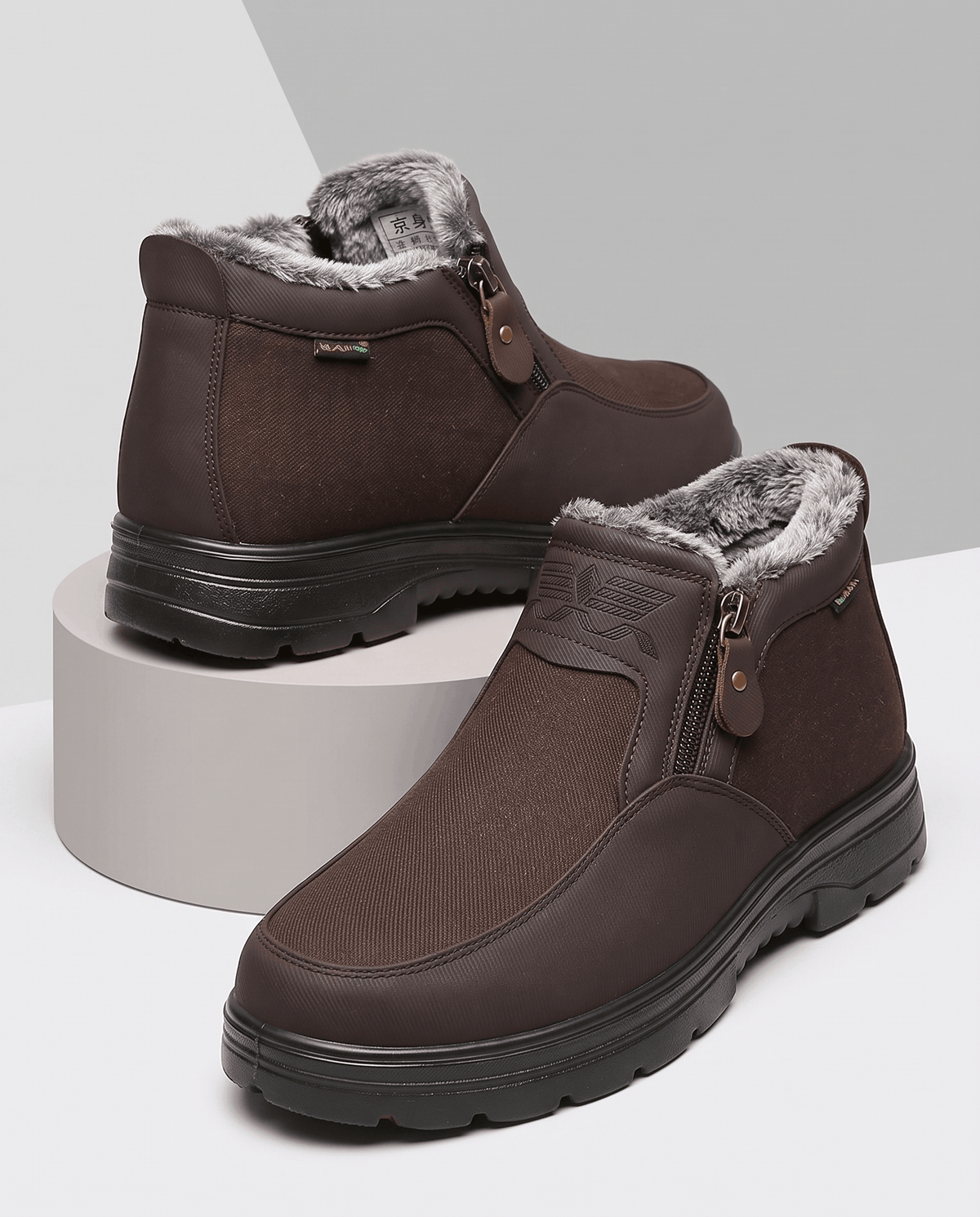 Pair of brown fleece-lined ankle boots displayed on a neutral background.