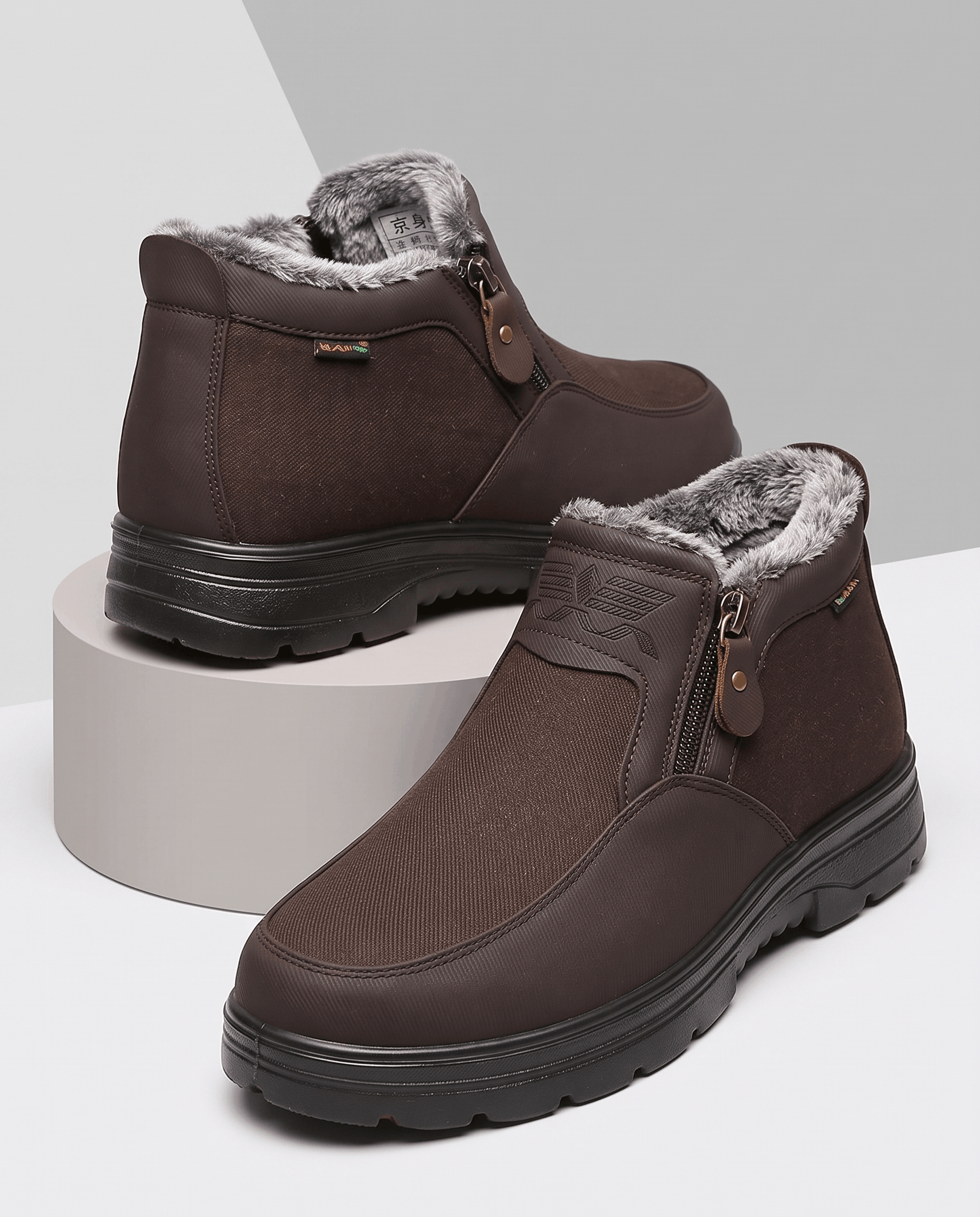 Pair of brown fleece-lined ankle boots displayed on a neutral background.