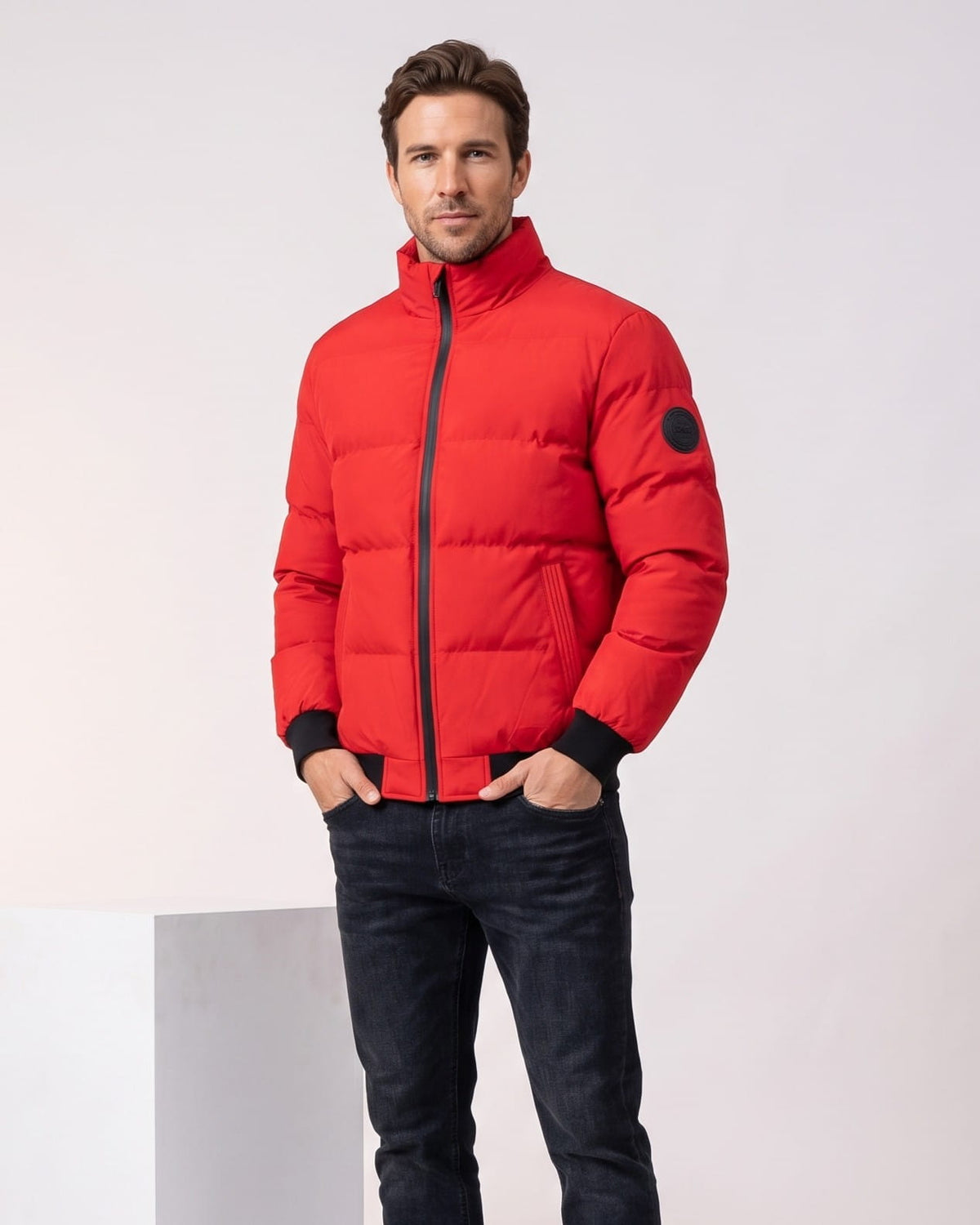 Red colorway zipped to the chest, black ribbed cuffs and hem clearly visible