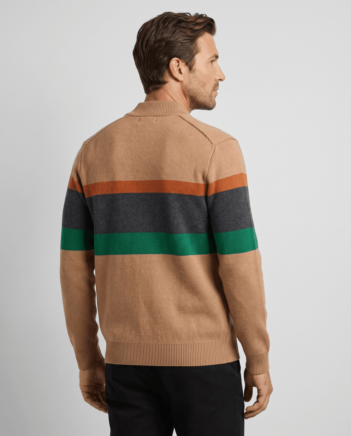 Back view of the beige cardigan showing the stripe bands and ribbed hem