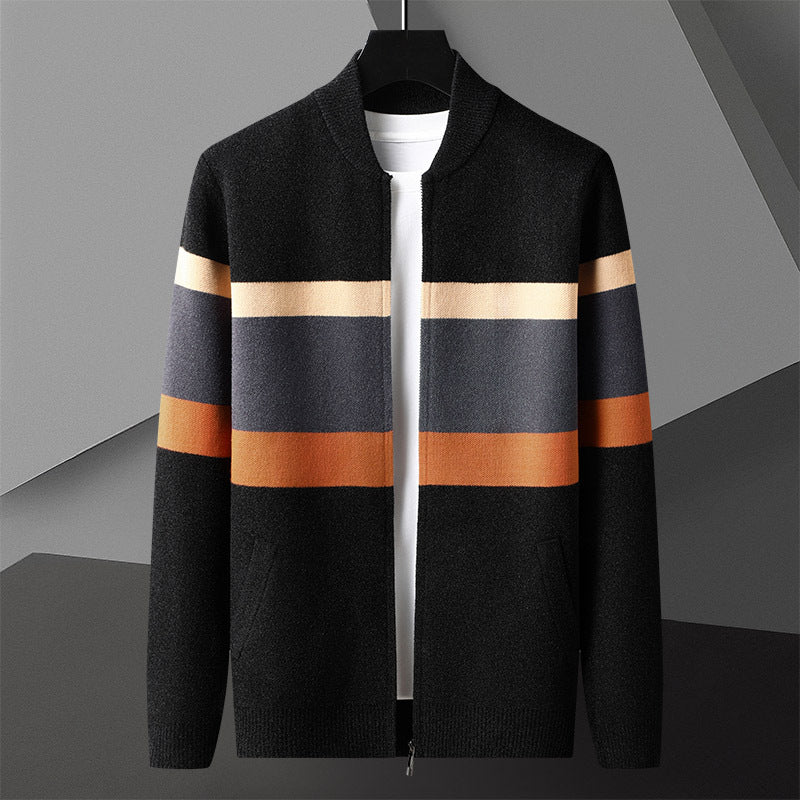 Black and orange striped zip cardigan displayed on a hanger with the front zip open