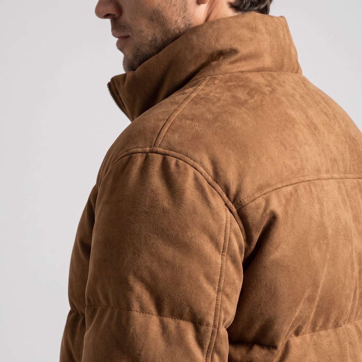 Collar and shoulder detail in brown, showing the soft matte nap up close