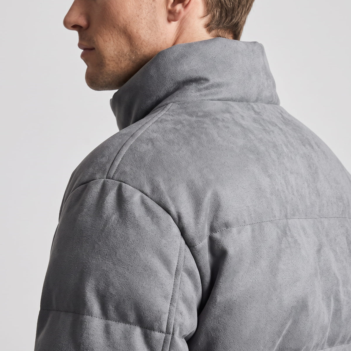 Collar detail in gray, showing the brushed suede-look surface from behind