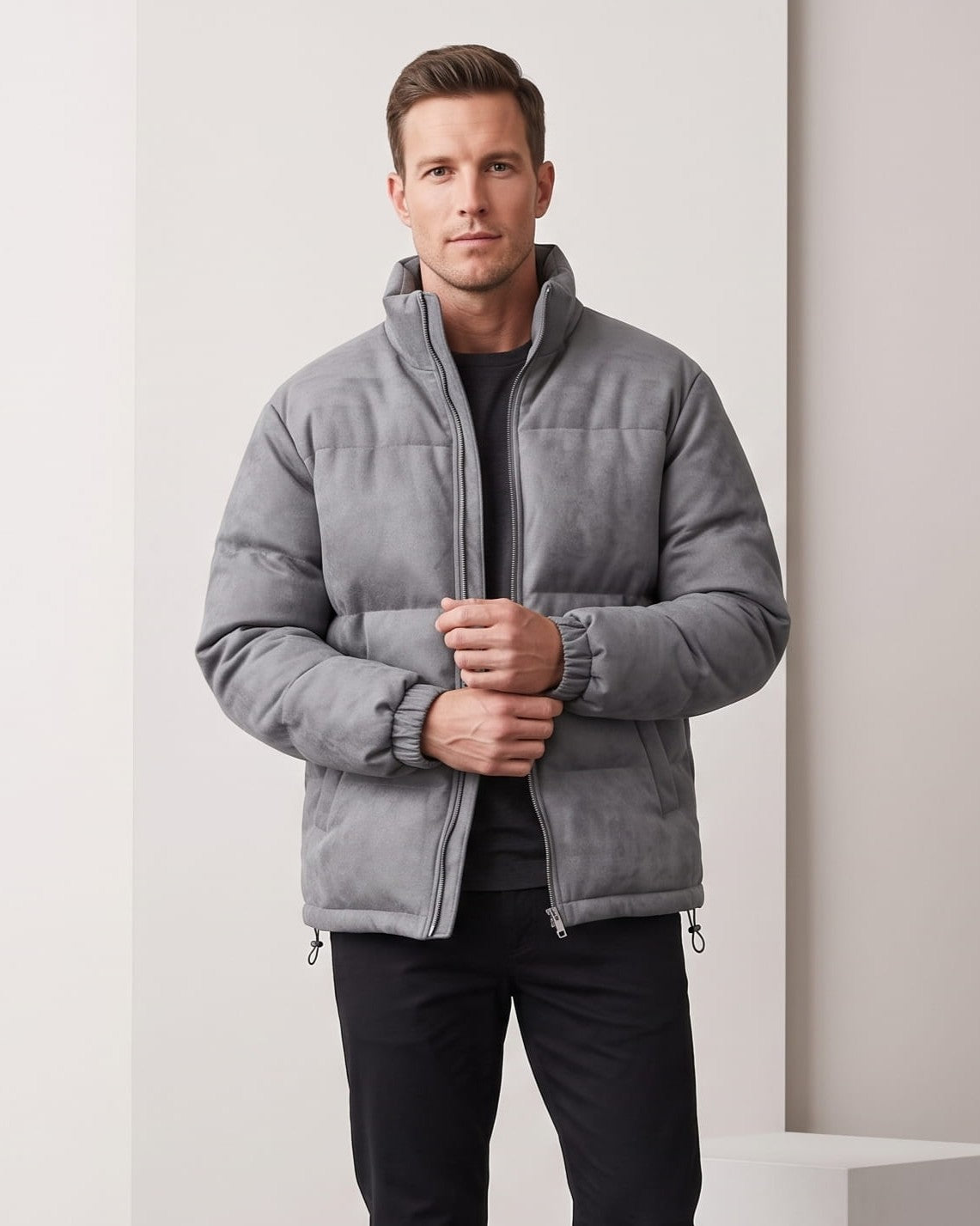 Gray colorway worn open over a dark top, collar standing at the neck