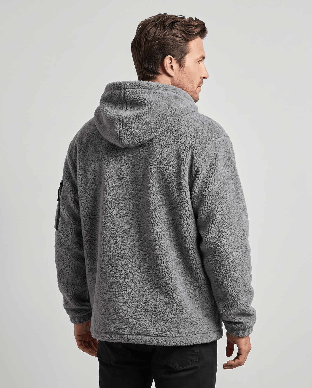 Back view of gray hooded jacket showing soft pile texture