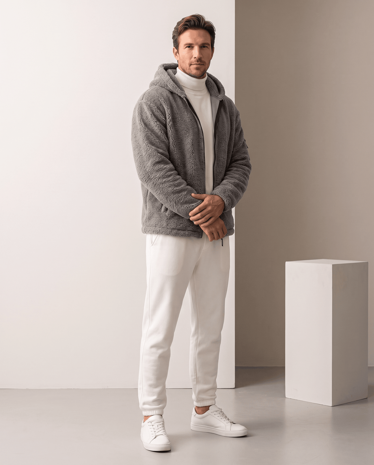 Full-length gray outfit with turtleneck, white joggers and white sneakers