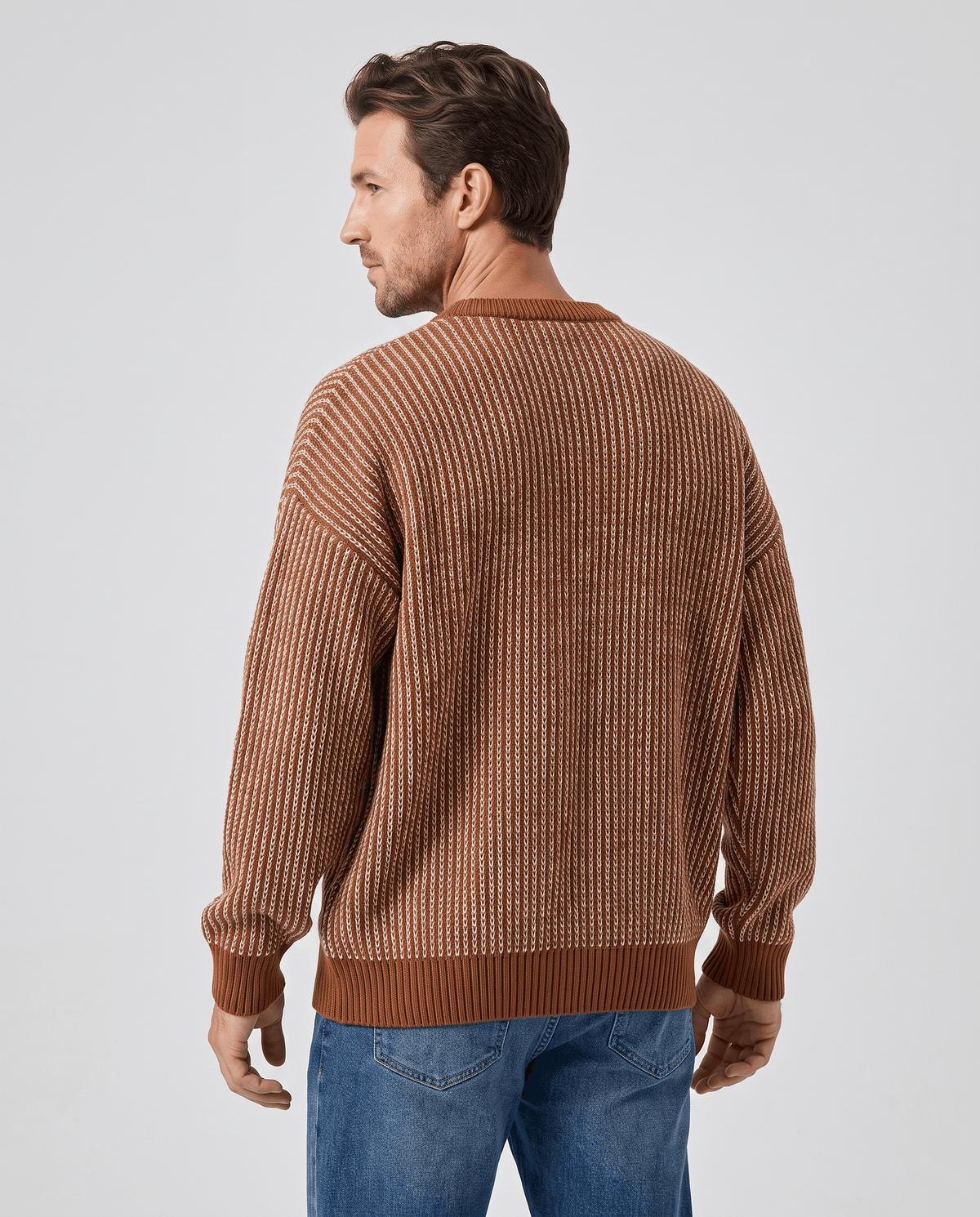 Back view of brown two-tone knit pullover with ribbed hem