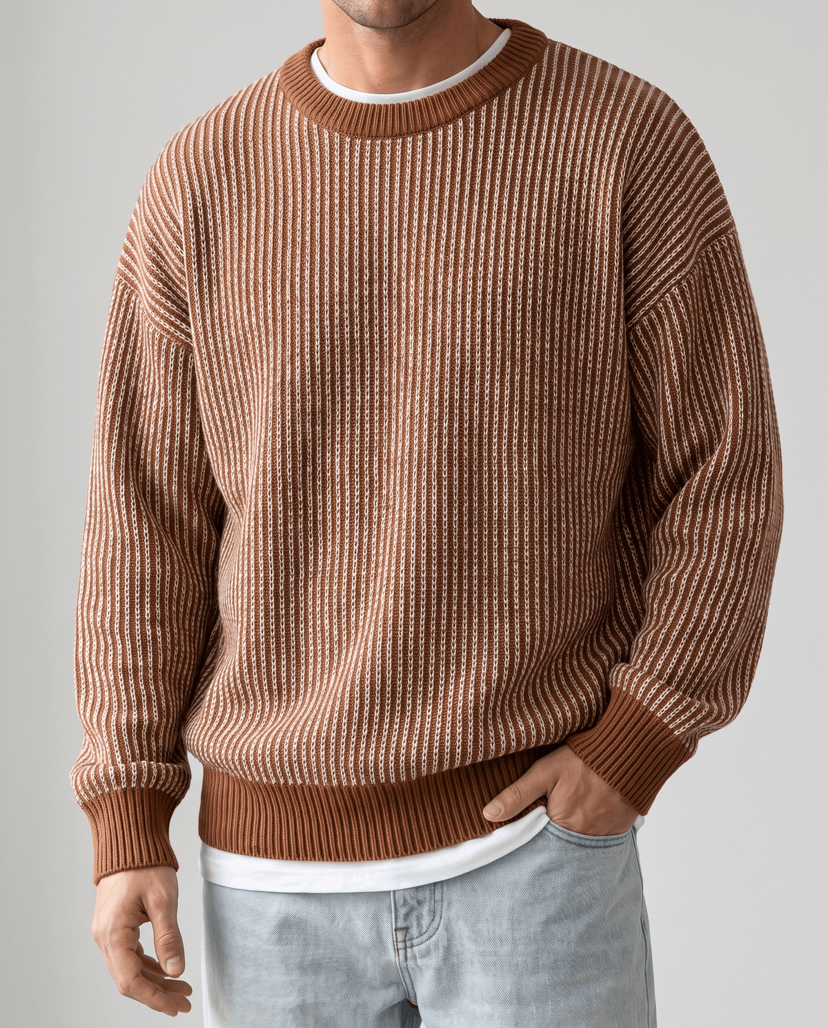 Front close-up of brown striped knit with rust ribbed trim over a white tee