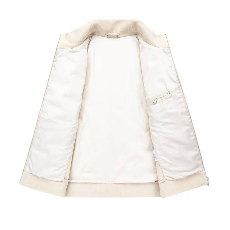 Inside lining and front zip of a white hybrid puffer jacket