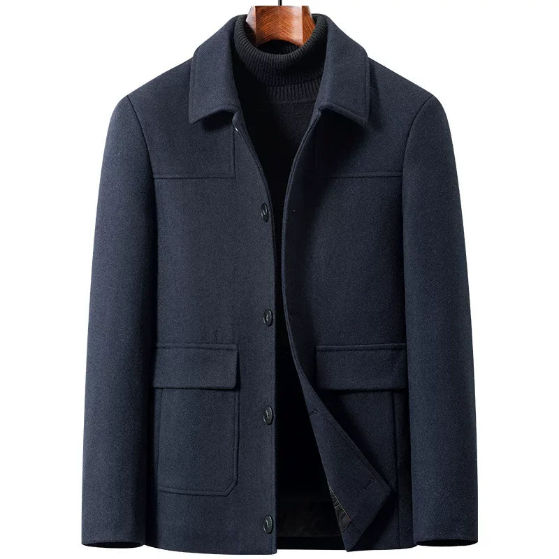 Navy coat on a form, front open with the lapel laid back