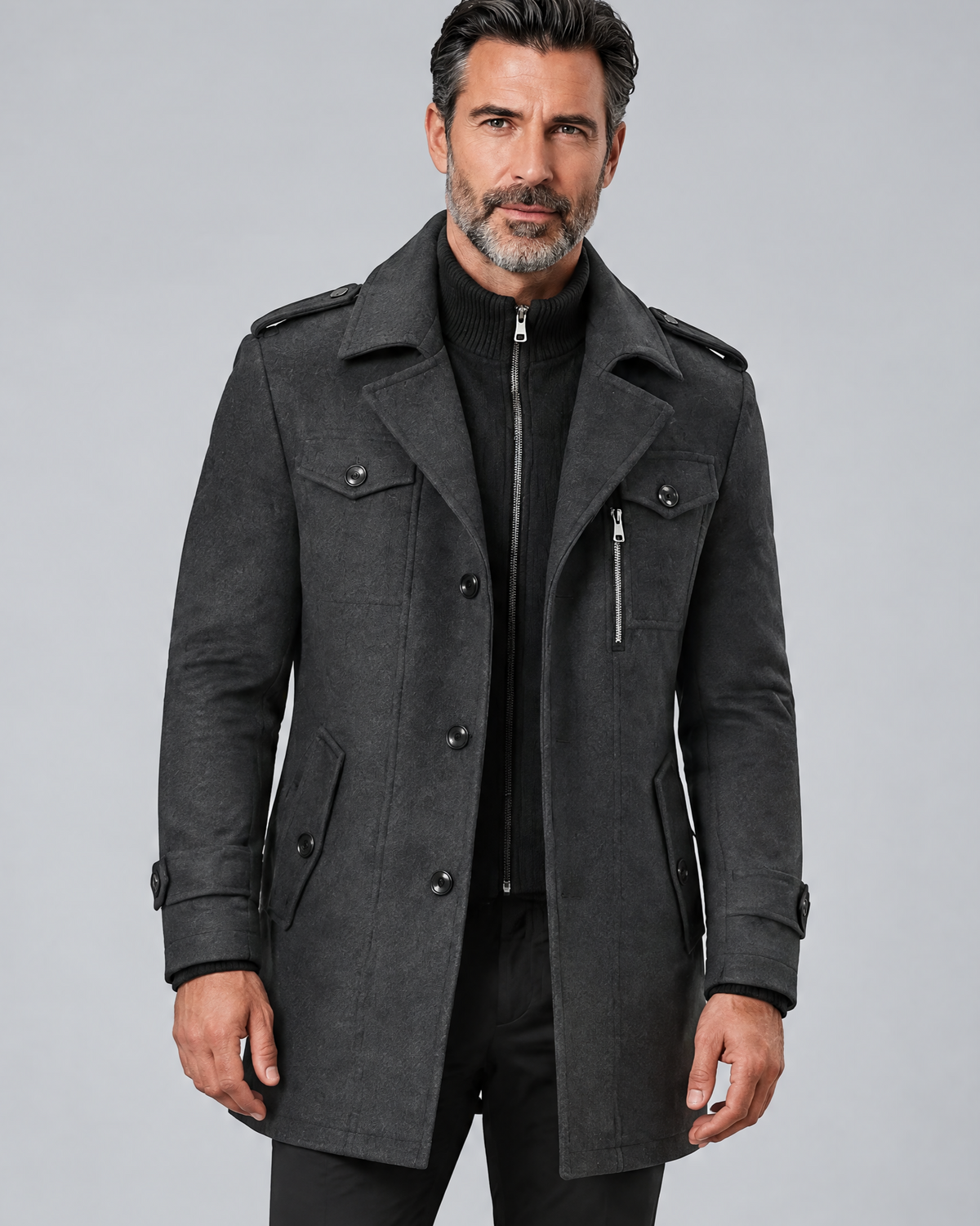 Gray coat with button flap pockets and a zip detail, worn closed, front view from the waist up