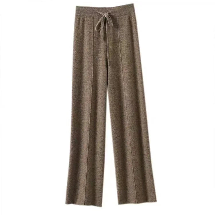 Flat lay of taupe wide-leg knit pants with contrast drawstring