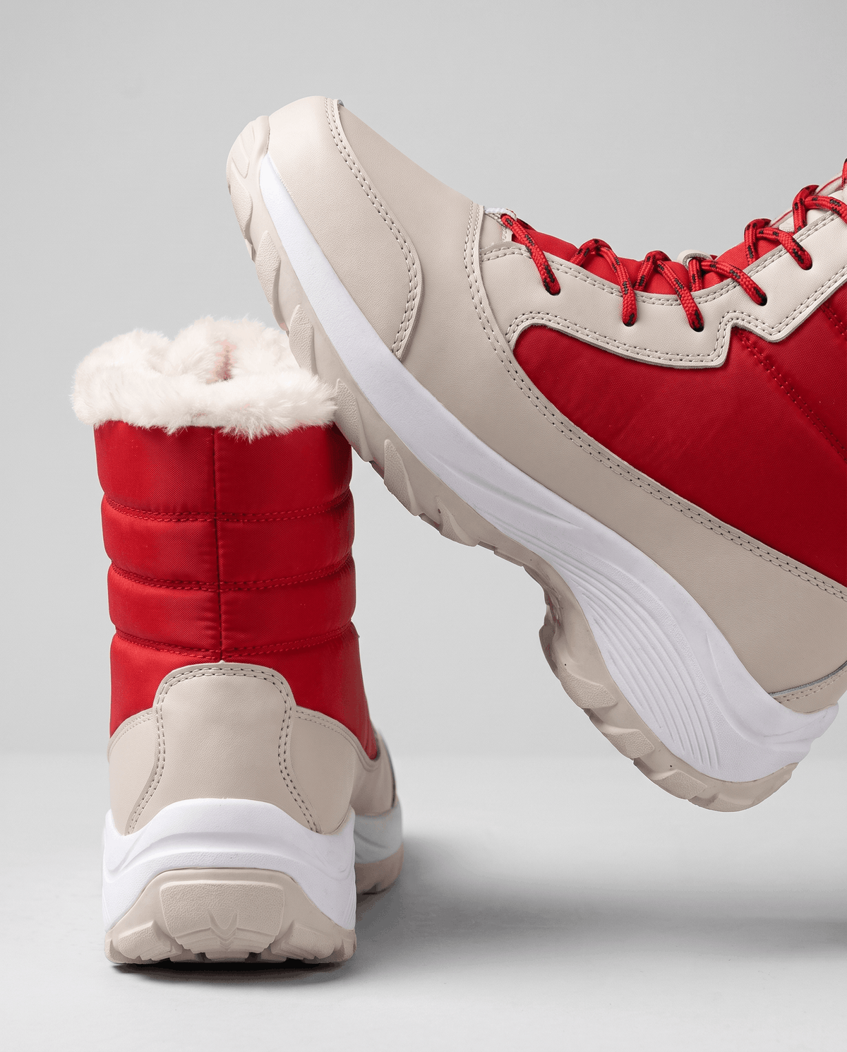 Red boots shown from back and side, revealing quilted upper and thick white platform sole