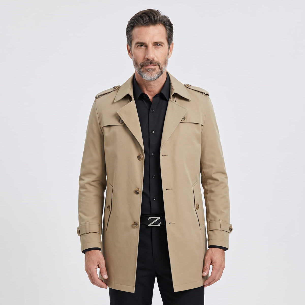 Model in khaki trench coat with epaulets and cuff straps, front view