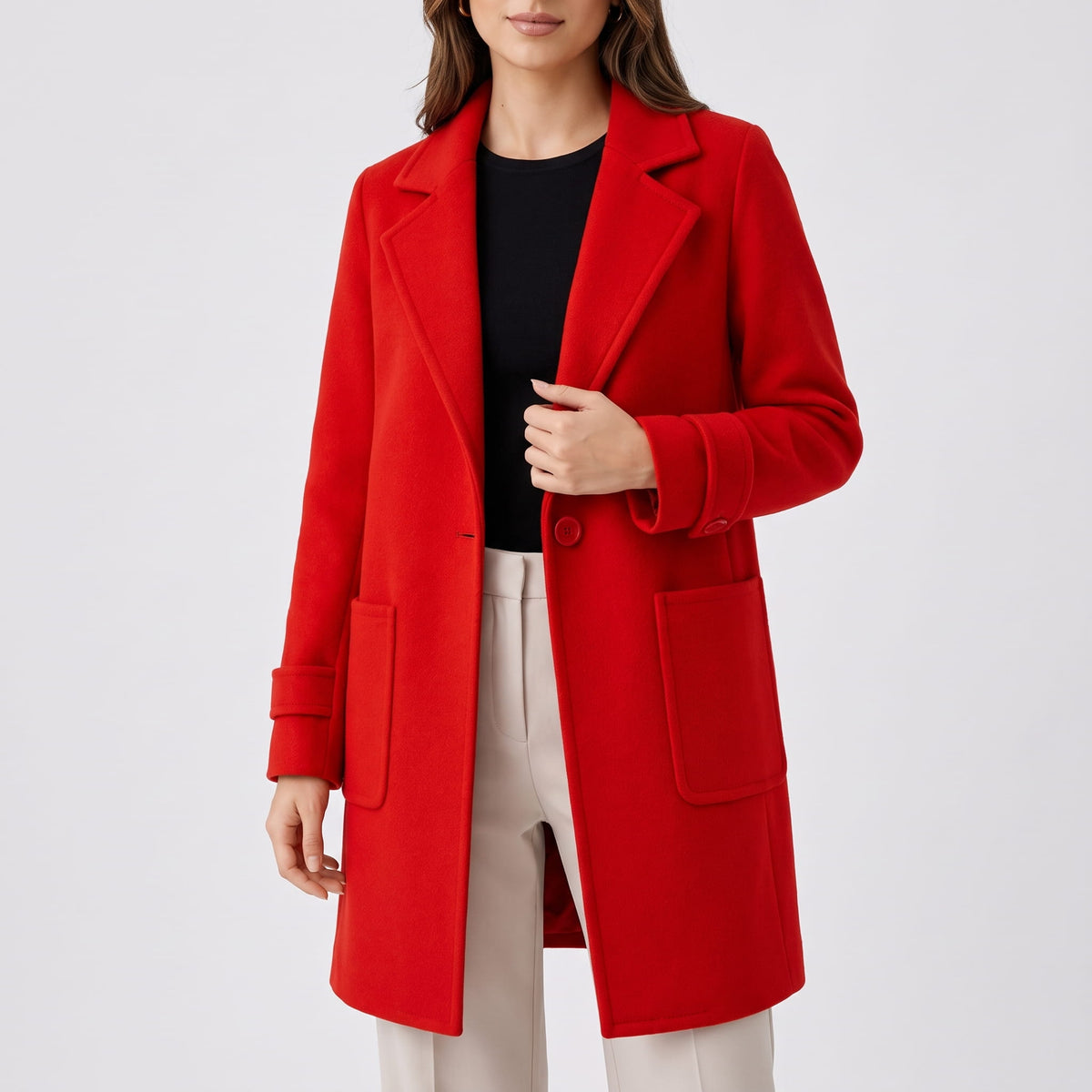 Cherry red coat worn open, showing patch pockets and single button