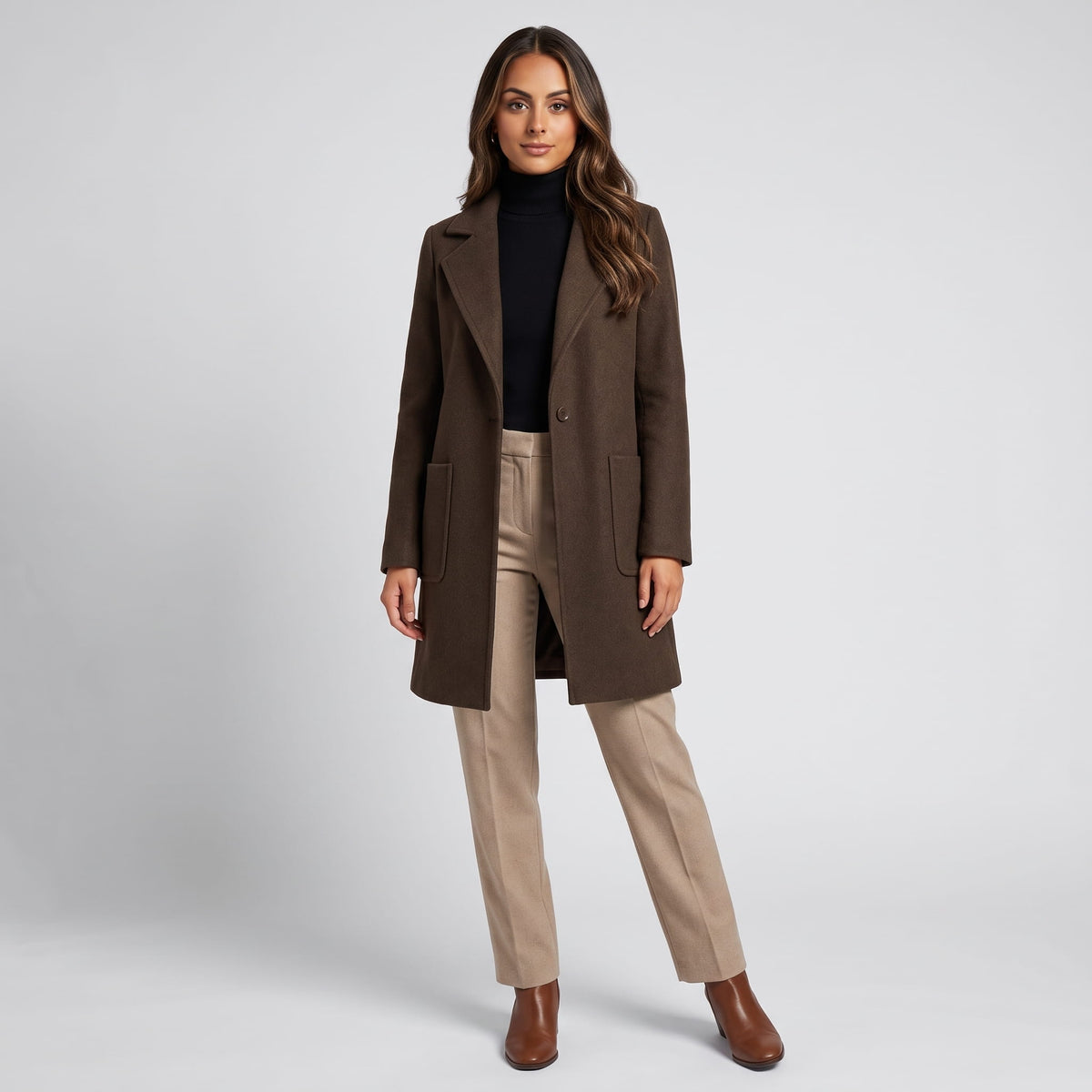 Full-length view of coffee brown coat with beige trousers and brown boots