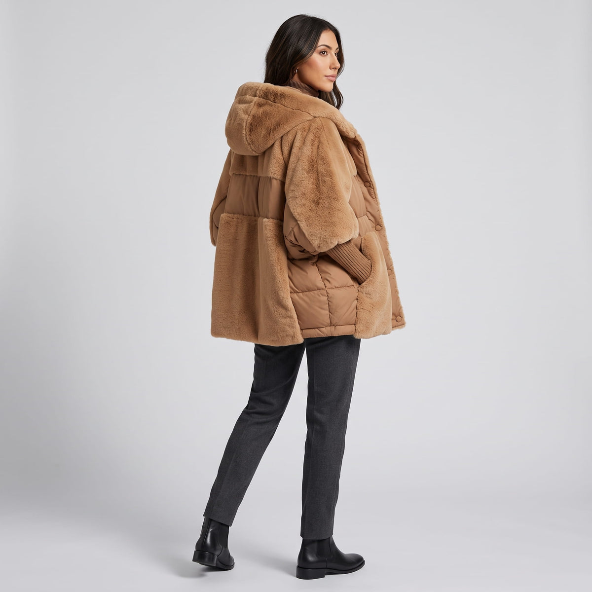 Back view of brown parka with plush hood and wide dolman sleeves