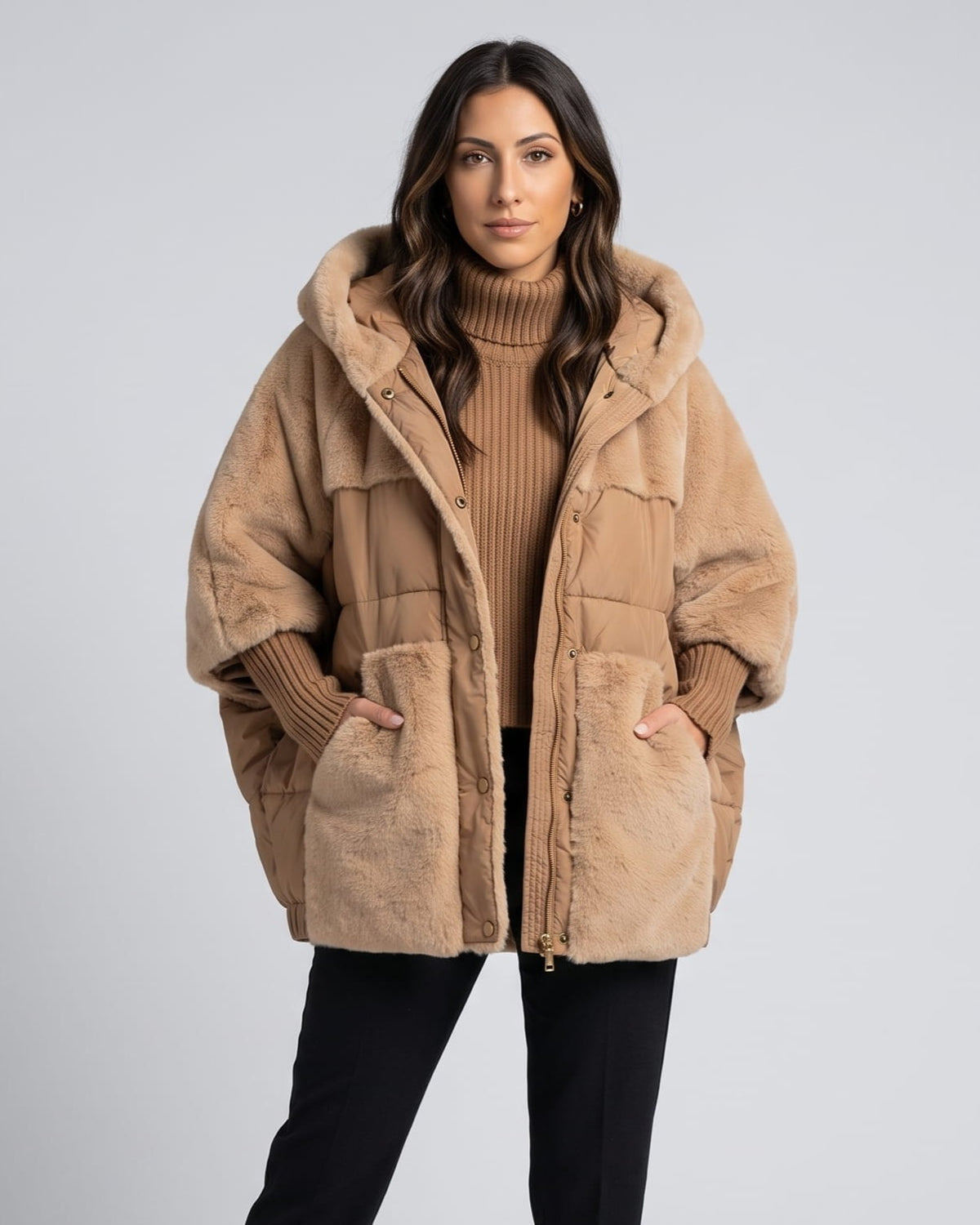 Woman in brown oversized hooded parka over a caramel turtleneck