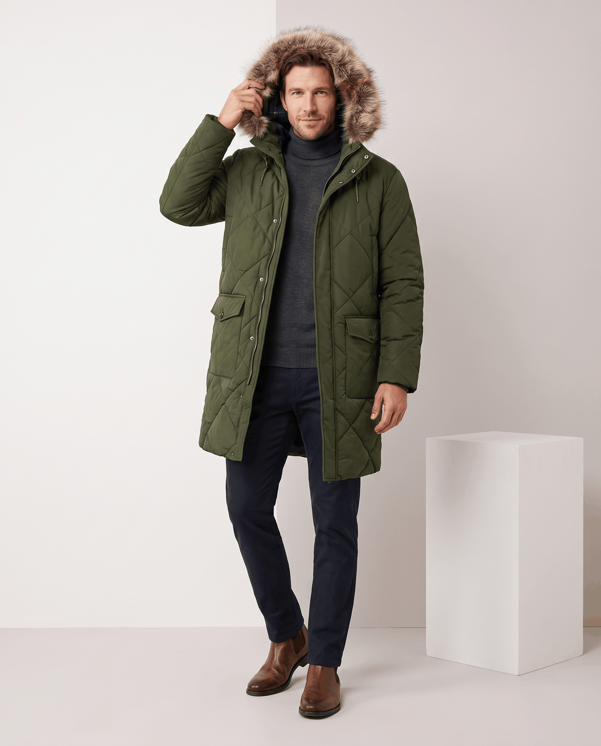 Men's army green quilted long parka, full-length view with hood up