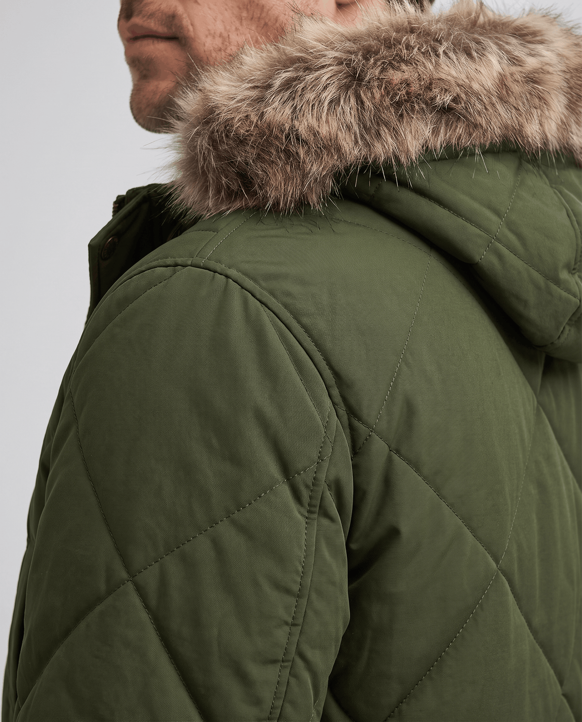 Men's army green quilted long parka, fur-trim hood and diamond quilting detail