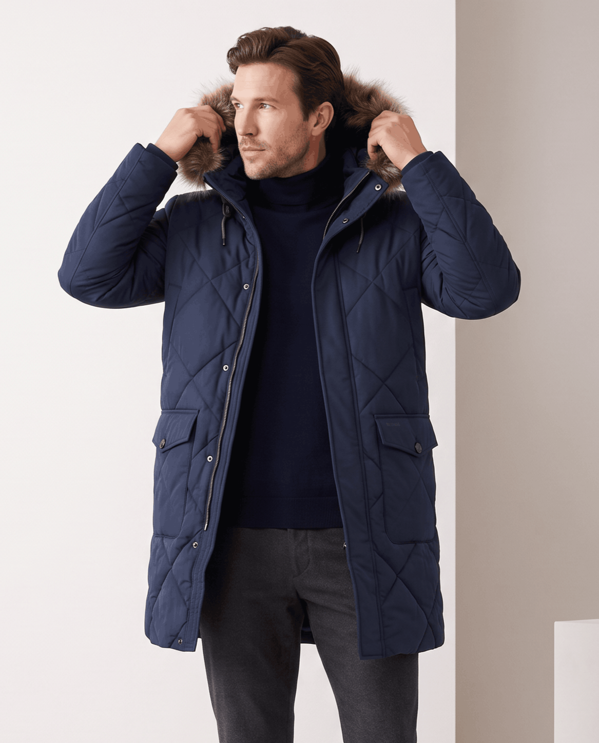 Men's navy blue quilted long parka, front view